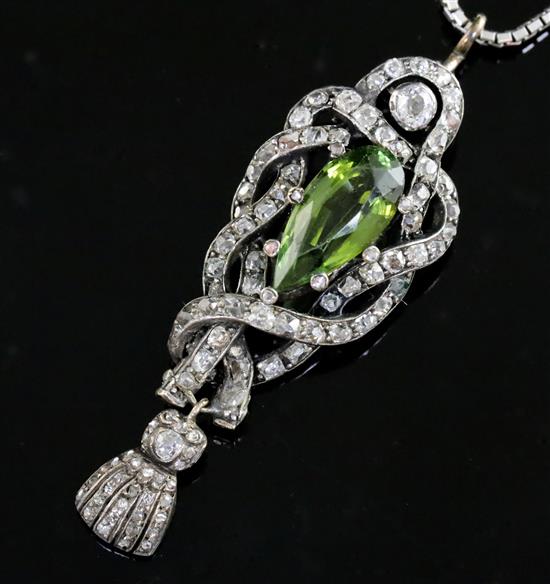 A Victorian gold and silver green tourmaline and diamond set drop pendant, pendant 53mm.
